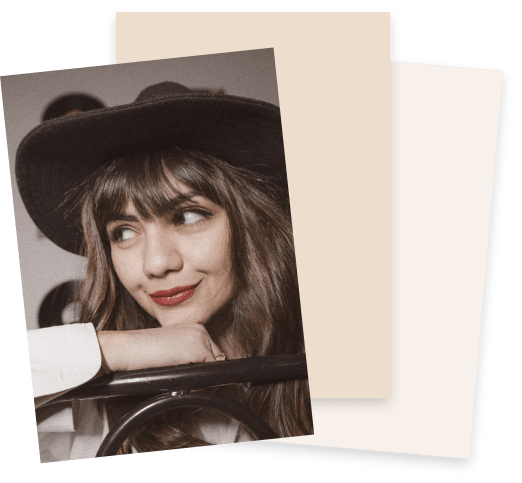 Portrait of a woman wearing a wide-brim hat, smiling softly, in a layered photo collage background.